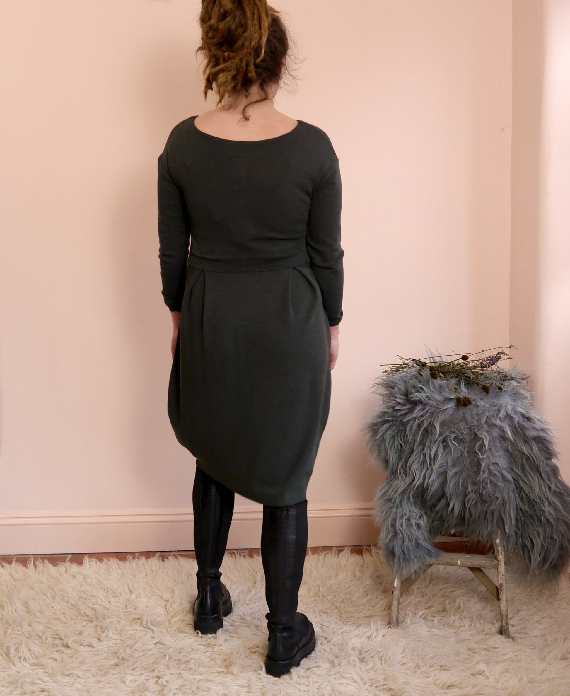 Merino Wool Round Neck Empire Waist Pleat Dress in Raven