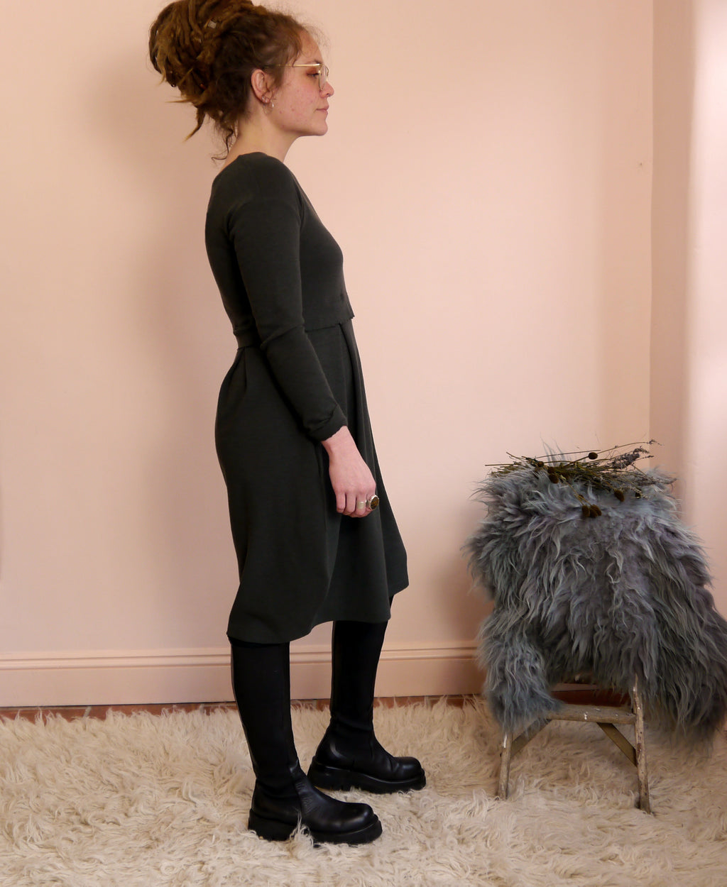 Merino Wool Round Neck Empire Waist Pleat Dress in Raven